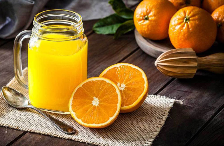 bệnh gout có được uống nước cam không